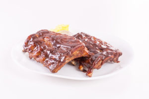 Ribs plated with sauce